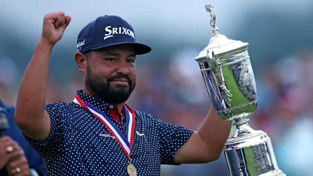 J.J. Spaun celebrates with the U.S. Open trophy after winning the 2025 championship at Oakmont Country Club.