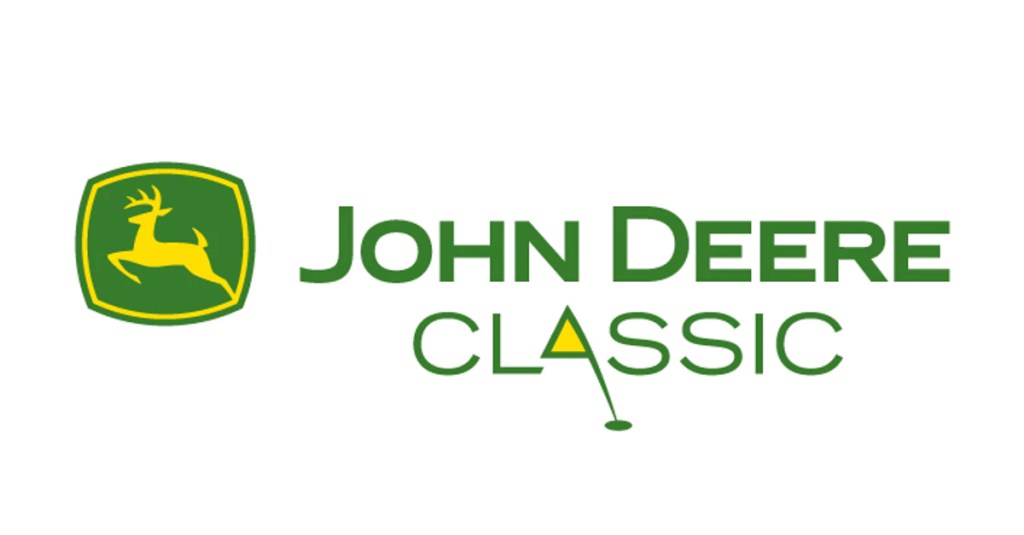 The official logo for the John Deere Classic golf tournament, featuring the yellow John Deere deer emblem to the left of the words "JOHN DEERE CLASSIC" in green. The "A" in "CLASSIC" is stylized as a golf flagstick and ball.
